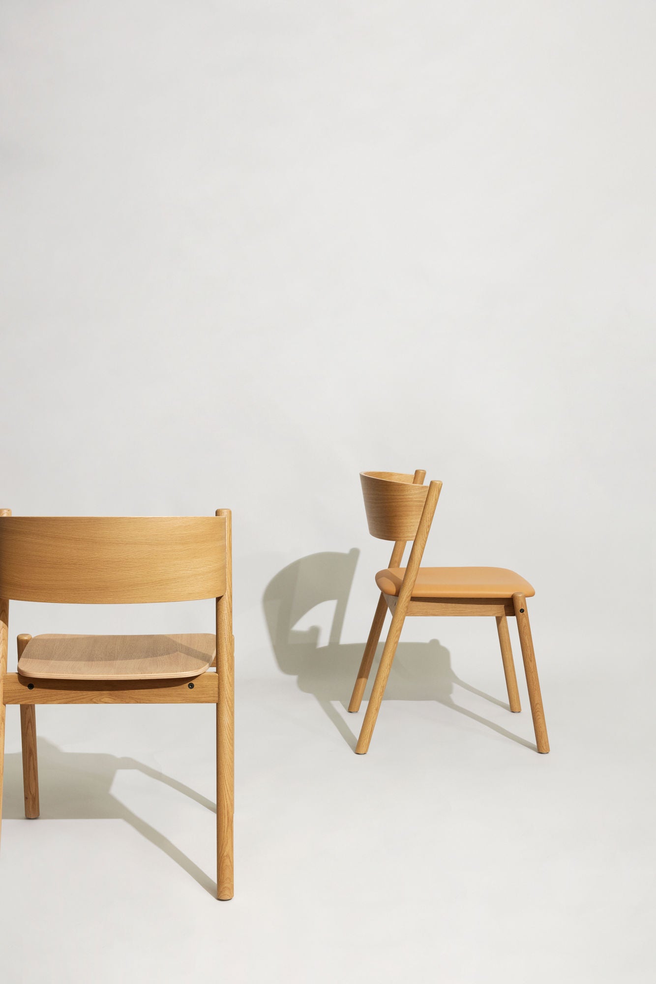Bambua Oblique sedia da pranzo rovere naturale impilabile